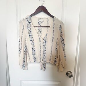 American Eagle Cream Blouse with Blue Floral Stripe Tie-Front